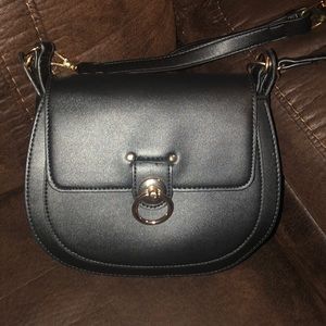Used but in Great Condition, Badgley Mischka black and gold crossbody purse.